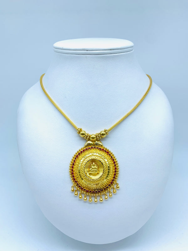 Temple design jewellery necklace with a circular pendant enriched with rubies, embossed details and moon balls with swinging balls.